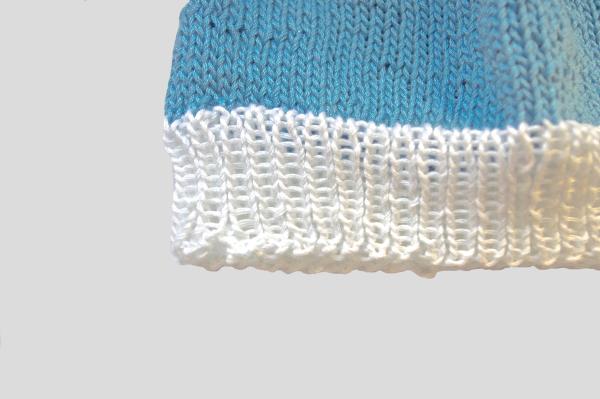 Cute hand knitted baby hat in light blue and white with a  head circumference 34 - 36 cm 13,39 - 14,17 inch